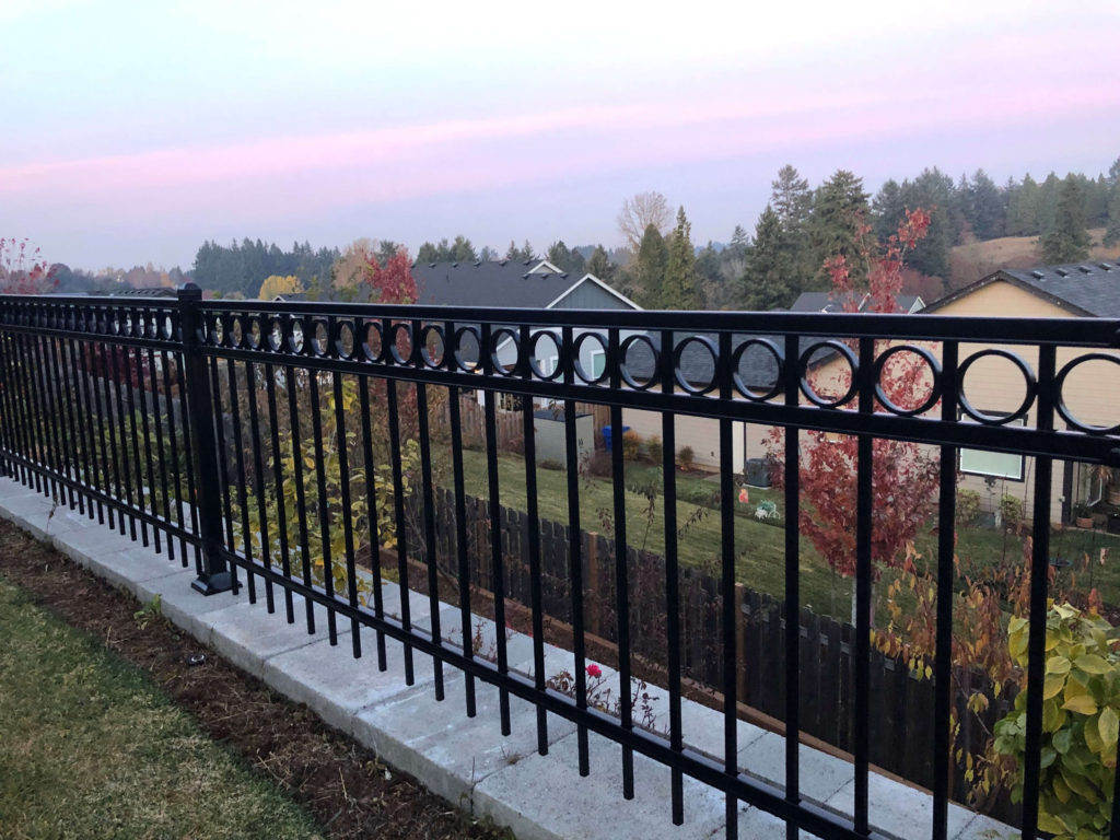 An ornamental iron fence installation by F&W  fence company