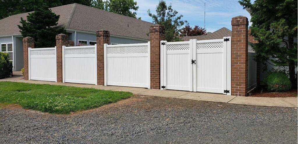 A  vinyl fence installation by F&W fence company