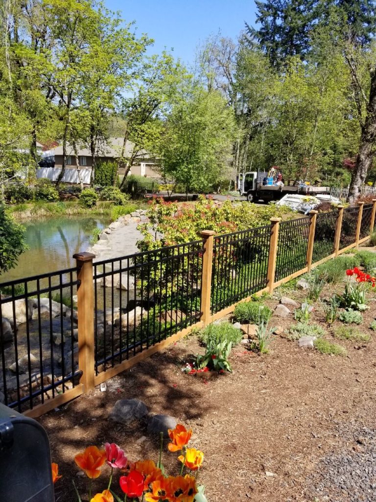   ornamental iron fence installation by F&W fence company