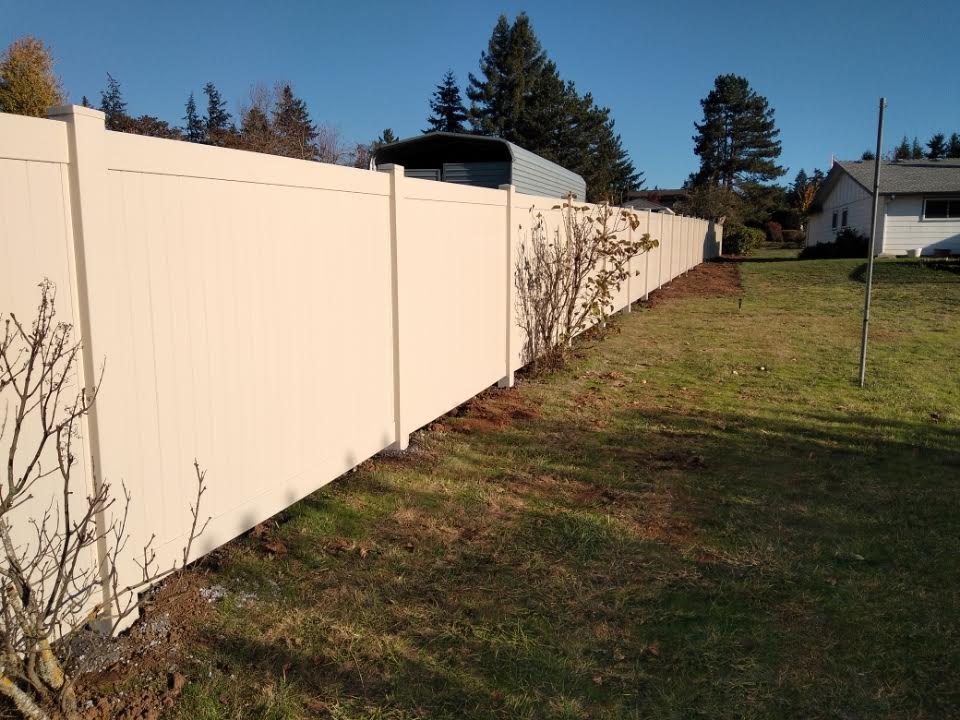 A  vinyl fence installation by F&W fence company